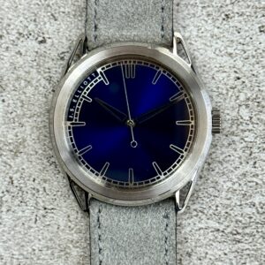 J.S. ELLIOTT THEORY ONE 38MM BLUE DIAL